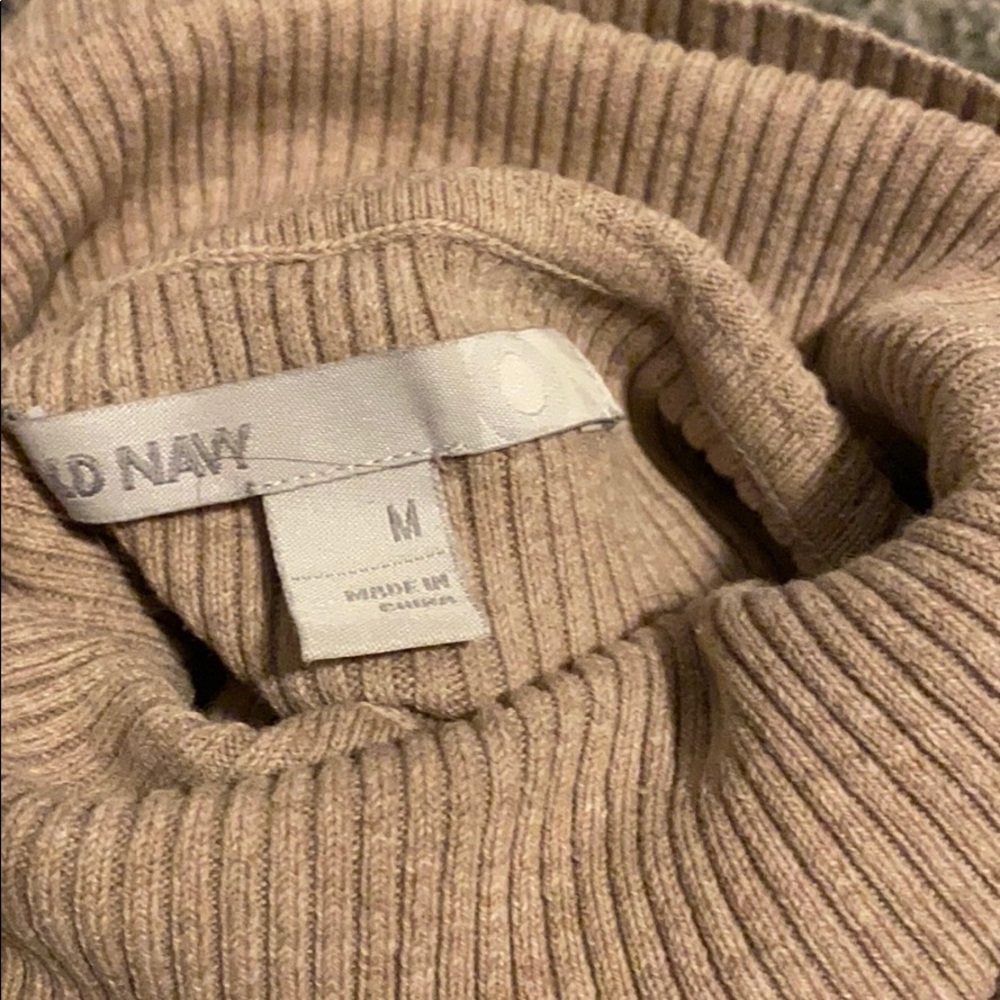 Tan turtleneck sweater